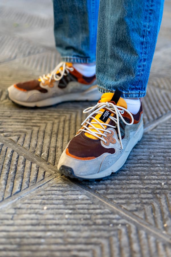 Saucony uomo jeans top